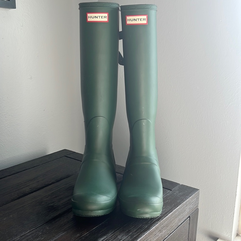 Brand new Hunter green rainboots, US size 8. They were a gift worn outside once